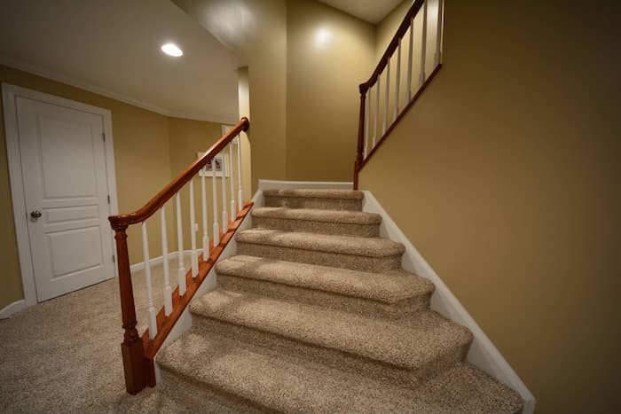 basement stairs finishing with carpets